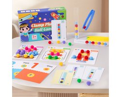 Kerstspeelgoed voor kinderen, een reageerbuisbalklemspel, een educatief speelgoed voor kinderen waarbij kleuren bij elkaar moeten passen.